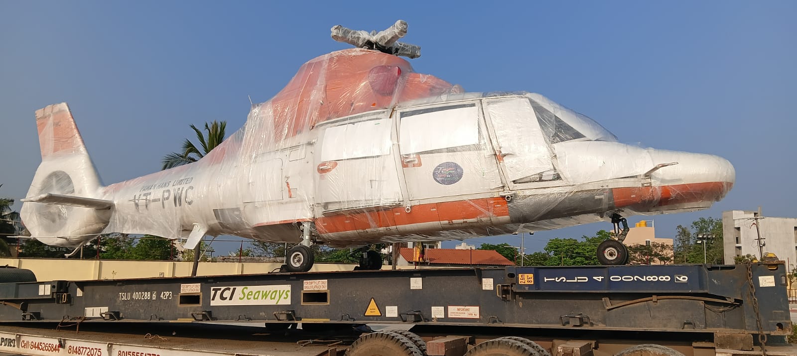 Helicopter secured on a flatrack container